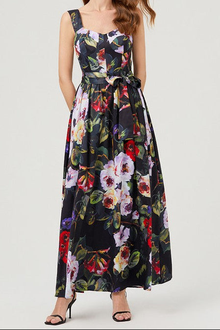 Woman wearing a floral dress on a white background